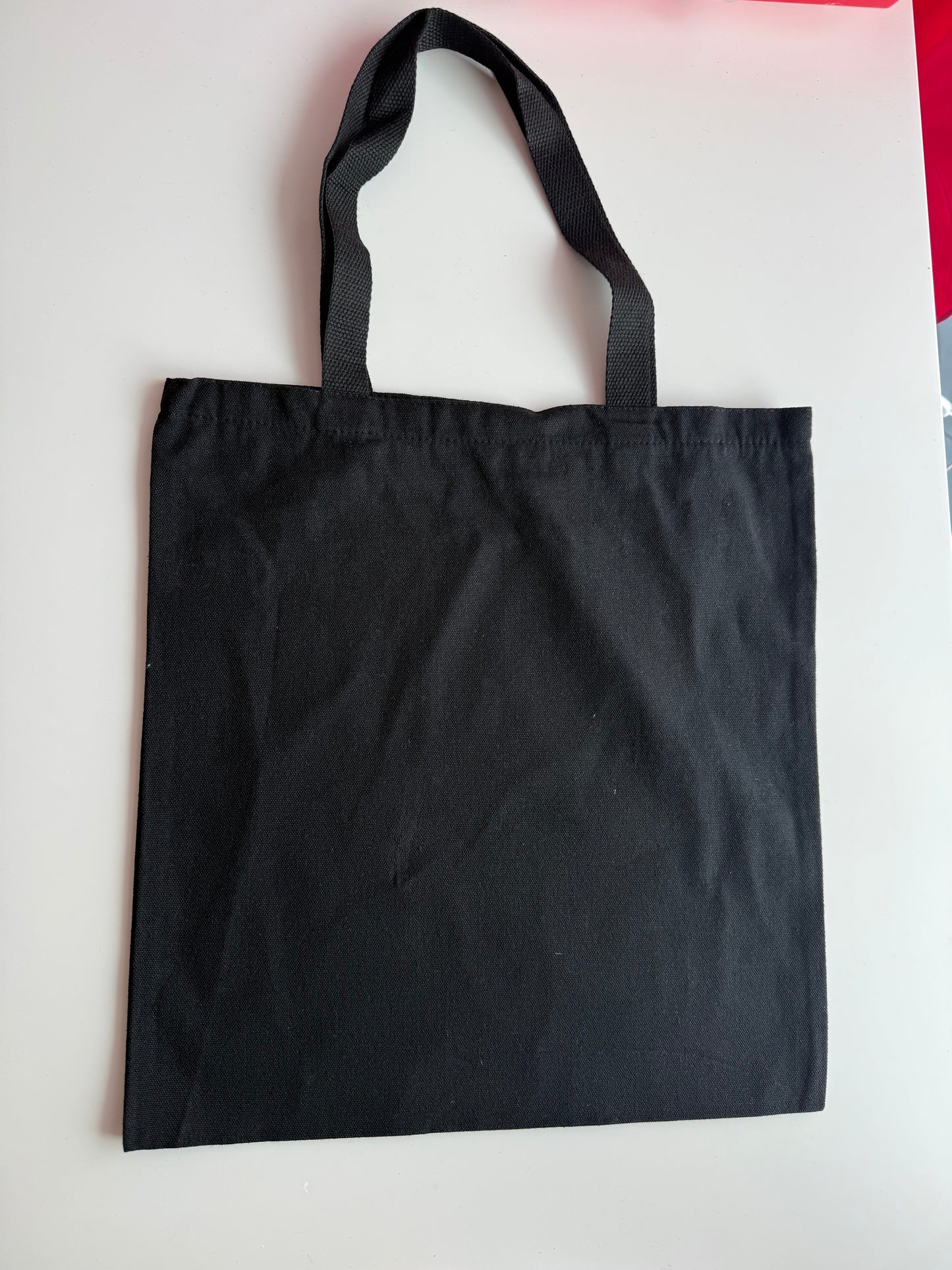 Schwarze Tasche bunte Henkel für Sticker Deine Tasche. Deine Idee. Dein Style.
