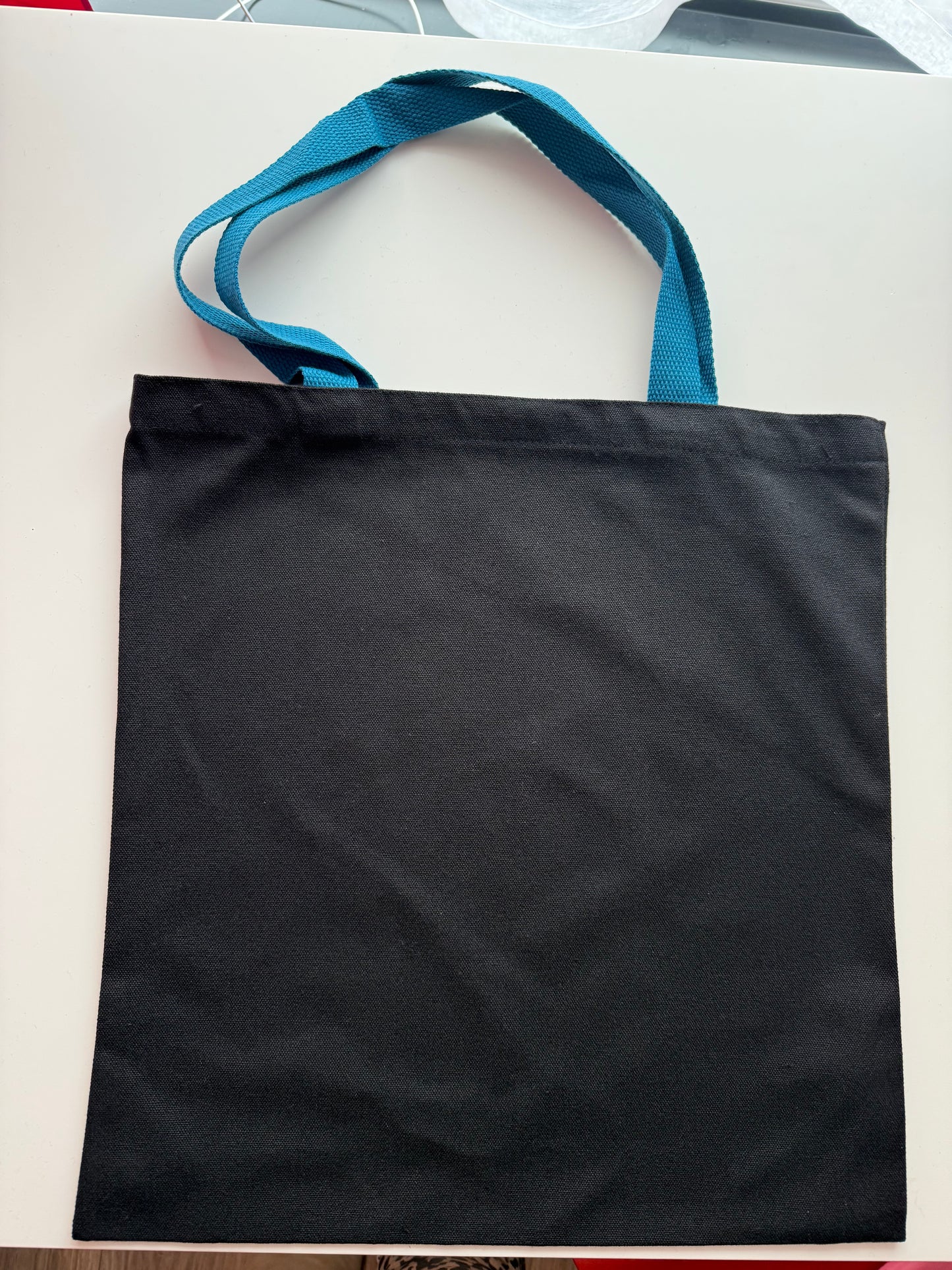 Schwarze Tasche bunte Henkel für Sticker Deine Tasche. Deine Idee. Dein Style.
