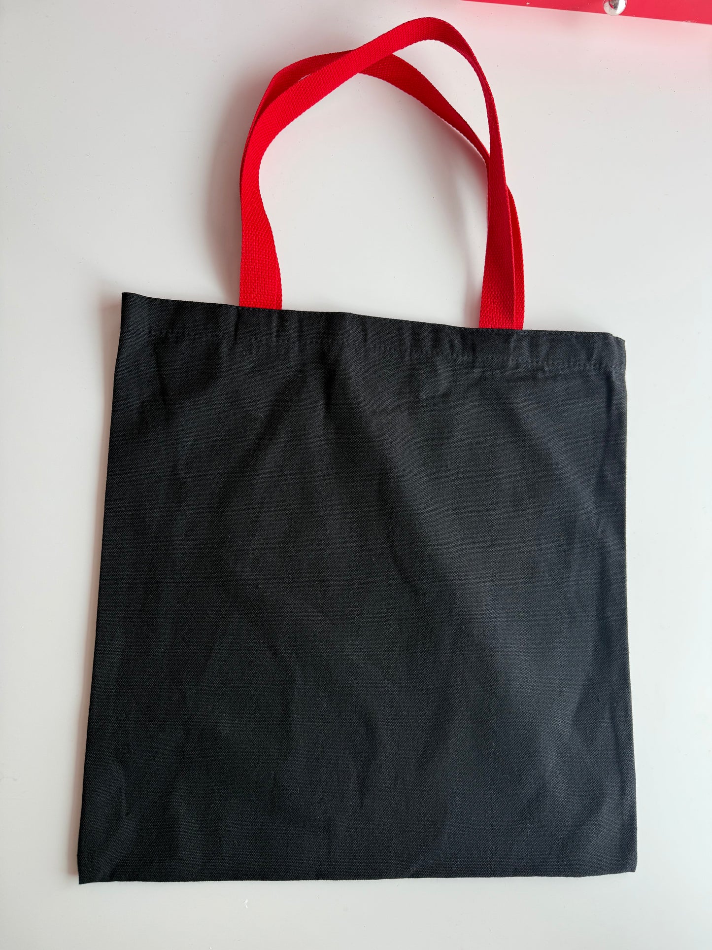 Schwarze Tasche bunte Henkel für Sticker Deine Tasche. Deine Idee. Dein Style.