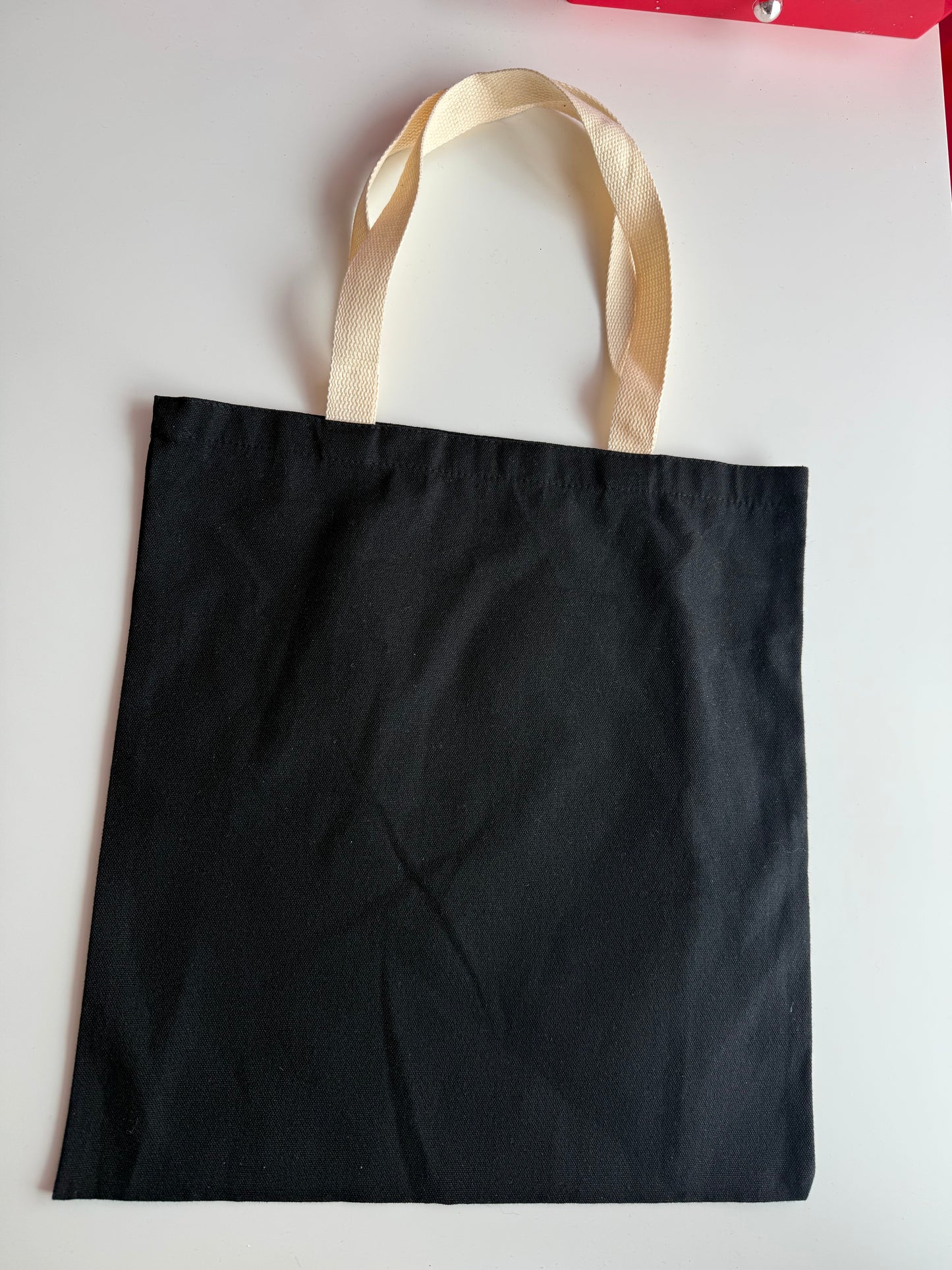 Schwarze Tasche bunte Henkel für Sticker Deine Tasche. Deine Idee. Dein Style.