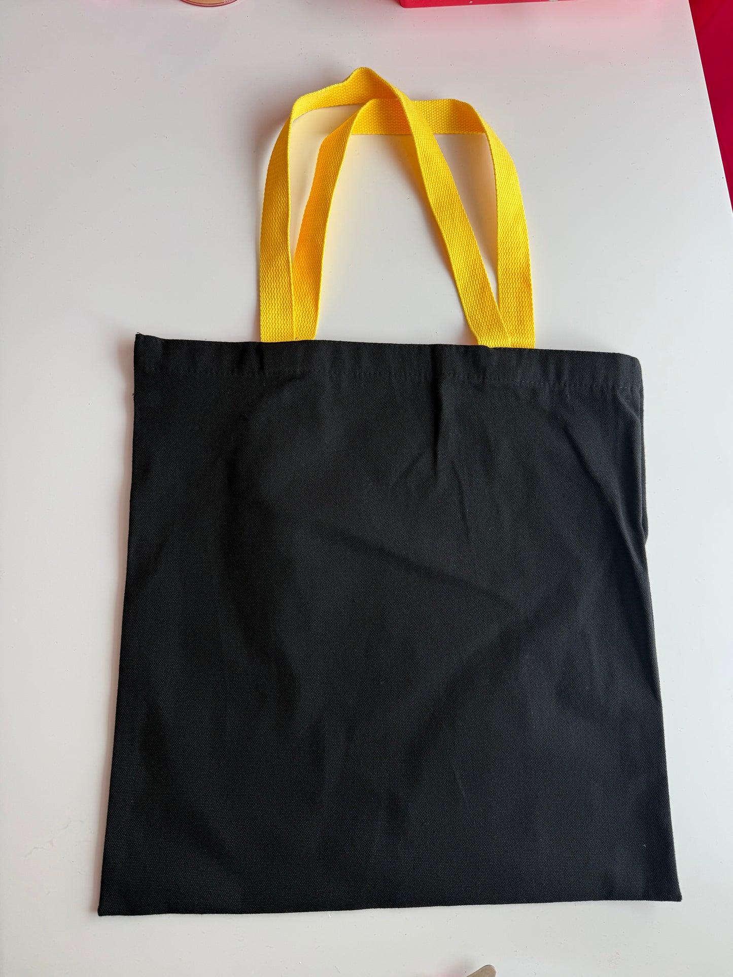 Schwarze Tasche bunte Henkel für Sticker Deine Tasche. Deine Idee. Dein Style.